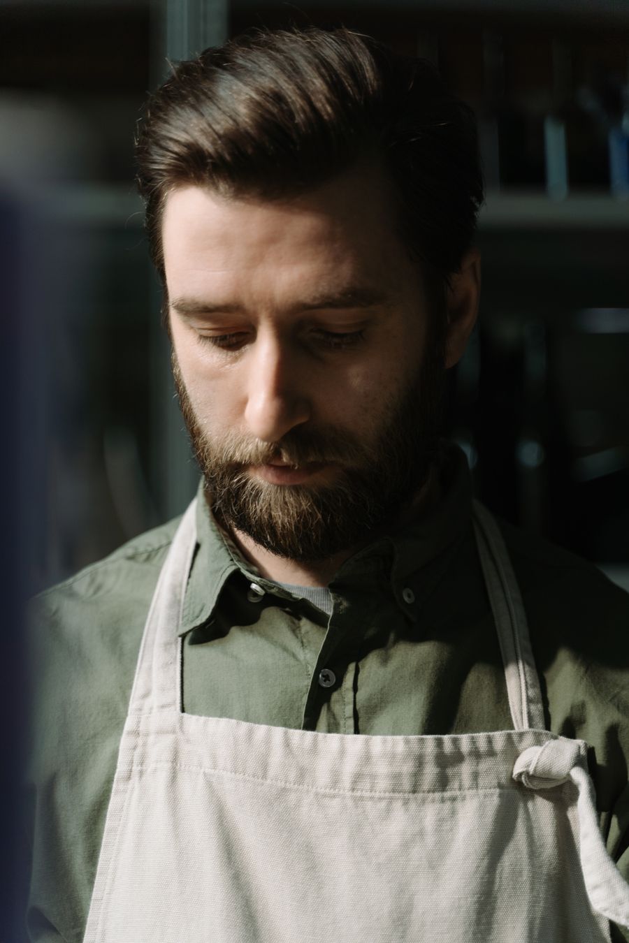 Marco Russo, founder of MELT, in the kitchen at dawn.